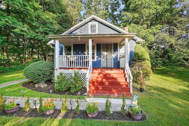 6 Gardner Hollow Rd, Poughquag, NY 12570 - bungalow-style home featuring covered porch, a front yard, and a chimney