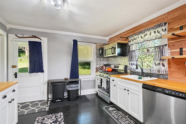6 Gardner Hollow Rd, Poughquag, NY 12570 - kitchen featuring stainless steel appliances, butcher block counters, dark wood finished floors, ornamental molding, and white cabinetry