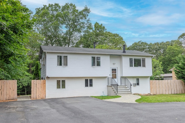 112 Middle Island Blvd, Middle Island, NY 11953 - bi-level home featuring asphalt driveway