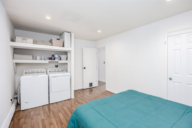 112 Middle Island Blvd, Middle Island, NY 11953 - bedroom with separate washer and dryer, light wood finished floors, and recessed lighting