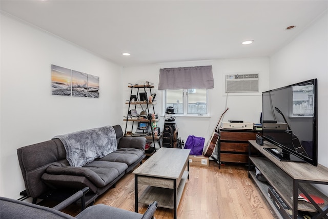 112 Middle Island Blvd, Middle Island, NY 11953 - living room with light wood-style flooring, recessed lighting, an AC wall unit, and crown molding