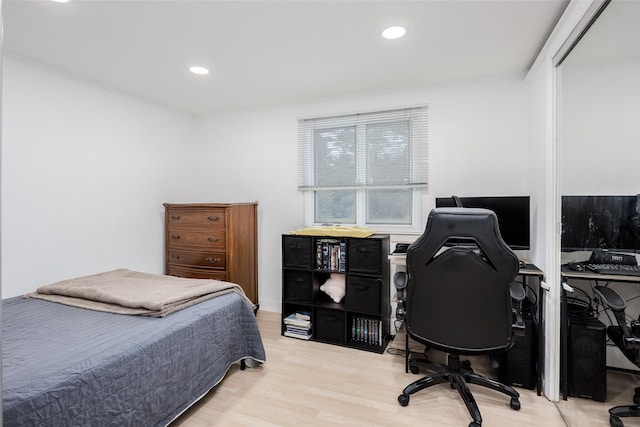 112 Middle Island Blvd, Middle Island, NY 11953 - bedroom with an office area, light wood-type flooring, recessed lighting, and a closet