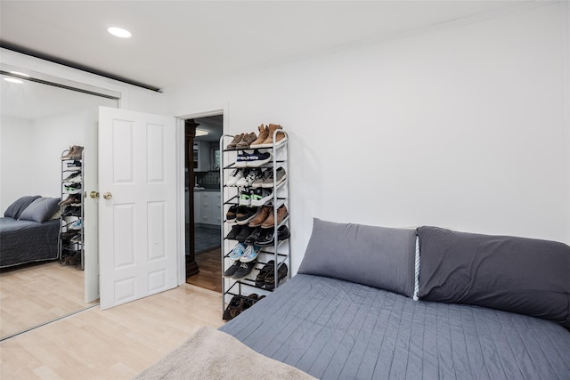 112 Middle Island Blvd, Middle Island, NY 11953 - bedroom with light wood-style floors, ornamental molding, and recessed lighting
