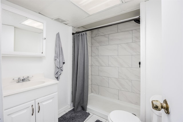 112 Middle Island Blvd, Middle Island, NY 11953 - bathroom featuring vanity, a tile shower, and tile patterned floors