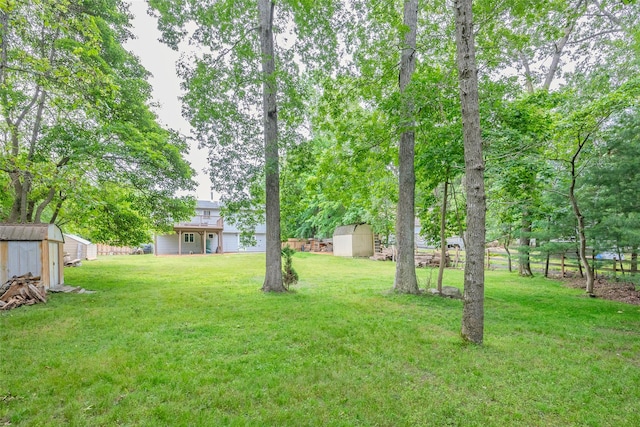 112 Middle Island Blvd, Middle Island, NY 11953 - view of grassy yard featuring a storage unit