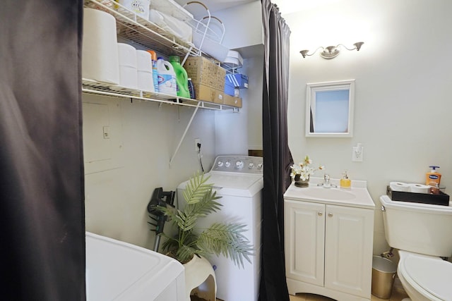 120 Fairview Cir Unit 120, Middle Island, NY 11953 - bathroom featuring washer / dryer, toilet, and vanity