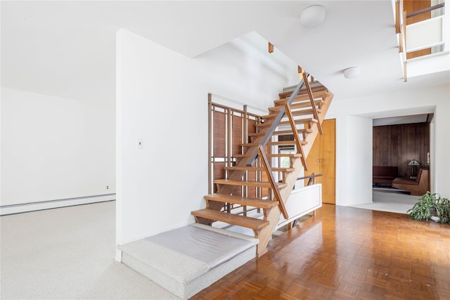 6 Bay View Dr, Hampton Bays, NY 11946 - staircase with a baseboard radiator