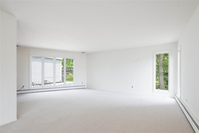 6 Bay View Dr, Hampton Bays, NY 11946 - carpeted spare room with a baseboard heating unit and baseboard heating