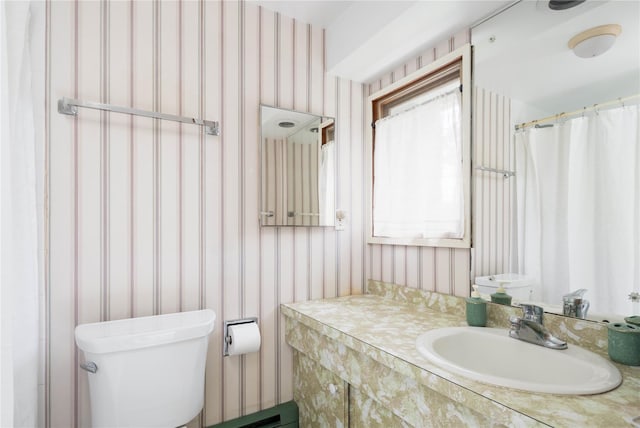 6 Bay View Dr, Hampton Bays, NY 11946 - full bathroom with wallpapered walls, toilet, and vanity