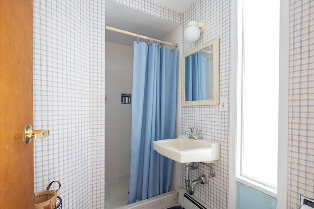 6 Bay View Dr, Hampton Bays, NY 11946 - bathroom featuring a stall shower and a sink