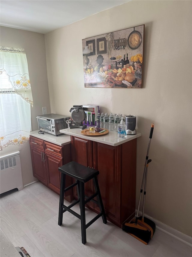 233-06 131st St Unit 1, Rosedale, NY 11412 - bar featuring radiator heating unit