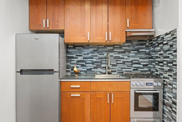 15 Oliver St Unit 3C, Brooklyn, NY 11209 - kitchen with stainless steel appliances, a sink, tasteful backsplash, and under cabinet range hood