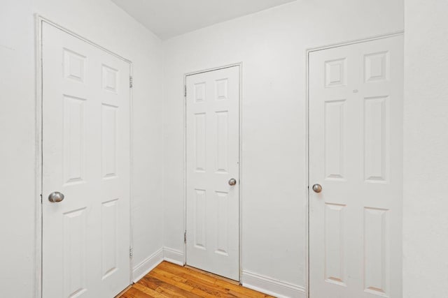 15 Oliver St Unit 3C, Brooklyn, NY 11209 - corridor with light wood-type flooring and baseboards