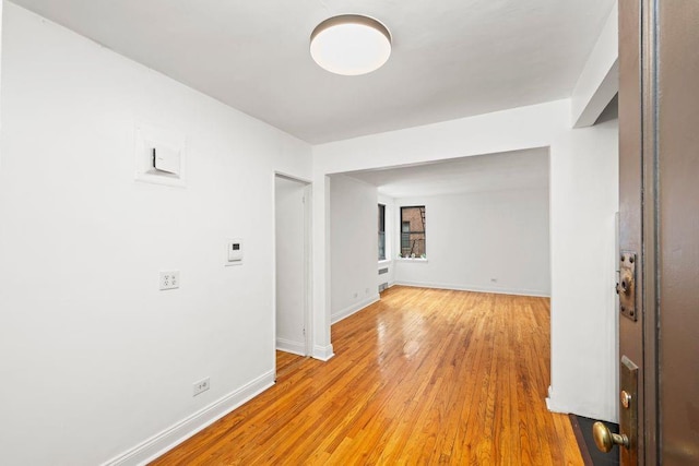 15 Oliver St Unit 3C, Brooklyn, NY 11209 - unfurnished room featuring baseboards and light wood-type flooring