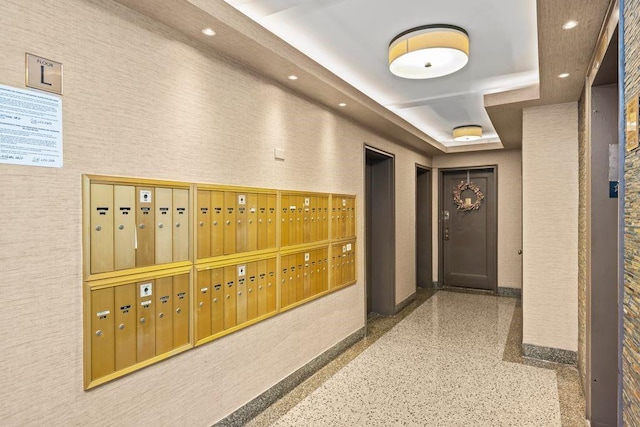 15 Oliver St Unit 3C, Brooklyn, NY 11209 - corridor featuring mail area, baseboards, speckled floor, recessed lighting, and a raised ceiling