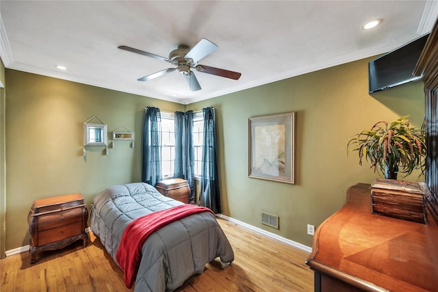 2193 Post St, East Meadow, NY 11554 - bedroom with baseboards, recessed lighting, light wood-style floors, ornamental molding, and a ceiling fan