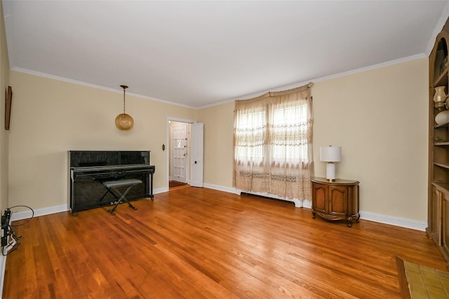 86-32 Avon St, Jamaica Estates, NY 11432 - living room featuring wood finished floors, baseboards, and crown molding