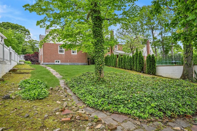 86-32 Avon St, Jamaica Estates, NY 11432 - view of yard featuring a trampoline