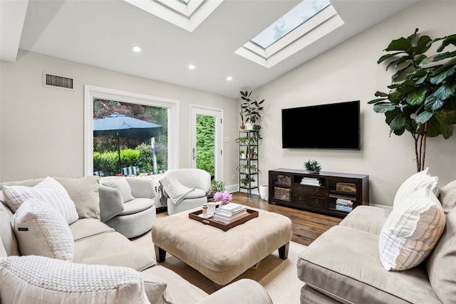 755 Webster Ave, New Rochelle, NY 10804 - living room featuring a skylight, wood finished floors, vaulted ceiling, recessed lighting, and baseboards
