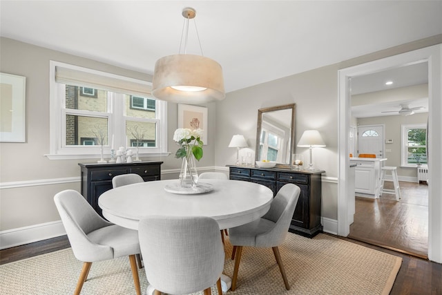 755 Webster Ave, New Rochelle, NY 10804 - dining room with radiator heating unit, wood finished floors, baseboards, a ceiling fan, and recessed lighting