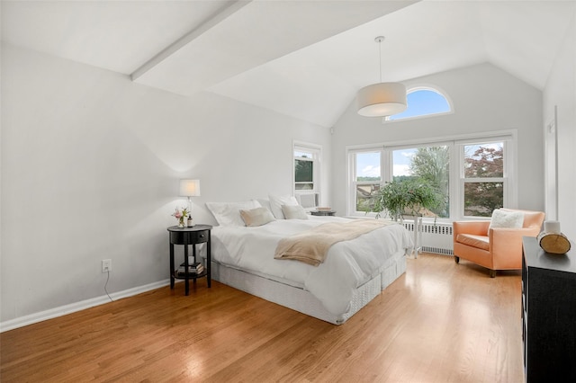 755 Webster Ave, New Rochelle, NY 10804 - bedroom with radiator heating unit, light wood-style flooring, vaulted ceiling, and baseboards