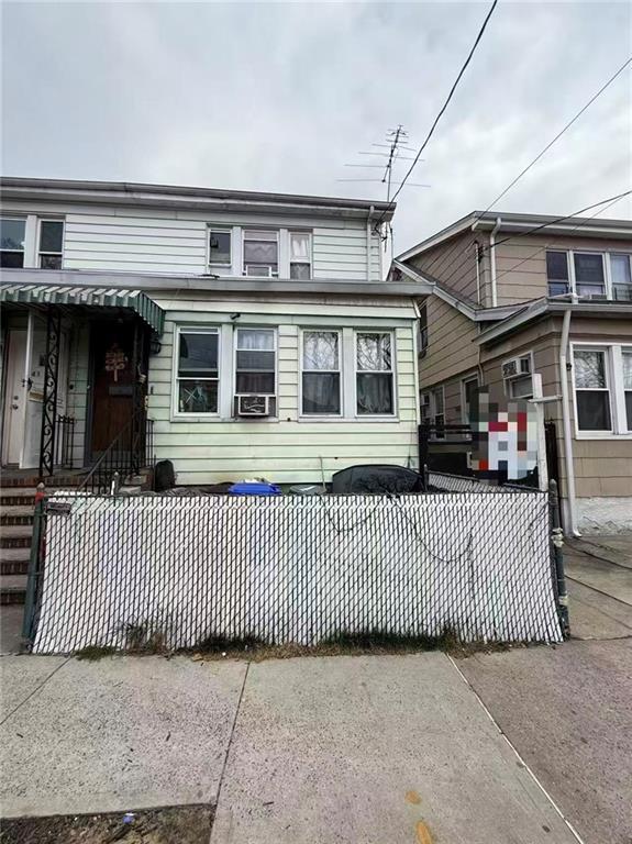 4131 95th St, Elmhurst, NY 11373 - view of front of property featuring a fenced front yard