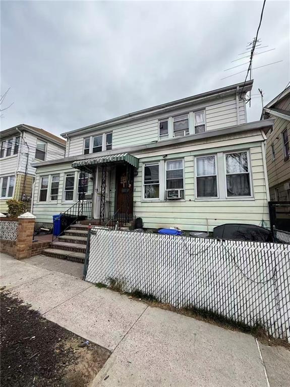 4131 95th St, Elmhurst, NY 11373 - traditional-style house with cooling unit