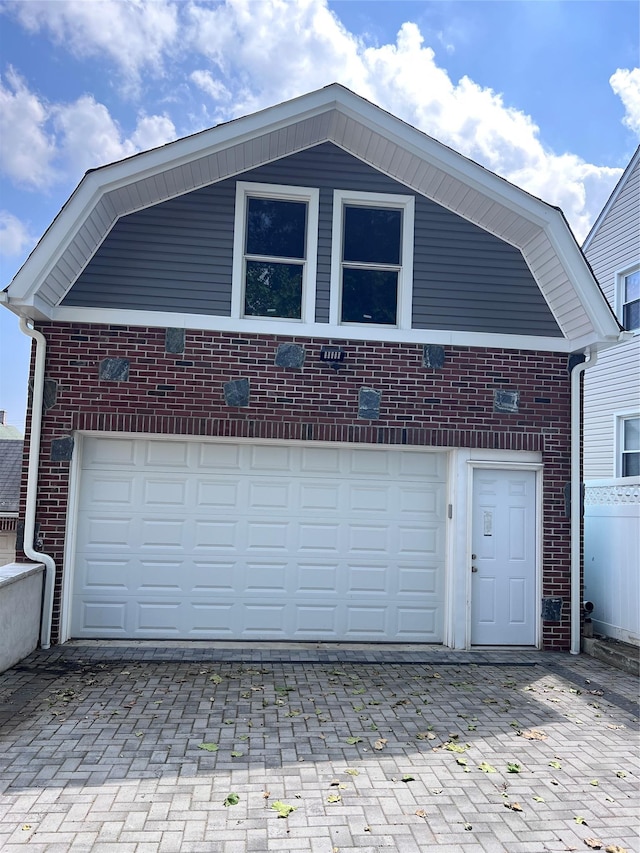 61 Edgewood Ave, Yonkers, NY 10704 - garage featuring decorative driveway