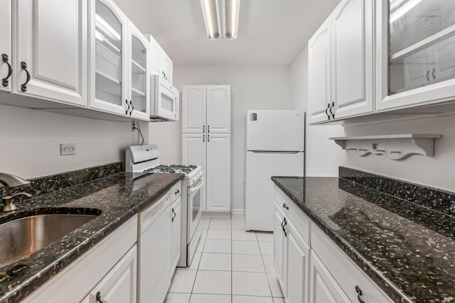 123-35 82nd Rd Unit 4H, Kew Gardens, NY 11415 - kitchen with white appliances, a sink, glass insert cabinets, and white cabinetry
