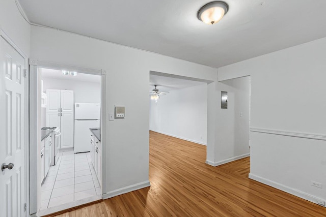 123-35 82nd Rd Unit 4H, Kew Gardens, NY 11415 - hallway featuring light wood-type flooring and baseboards