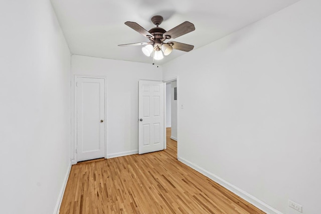 123-35 82nd Rd Unit 4H, Kew Gardens, NY 11415 - unfurnished bedroom featuring baseboards, light wood-type flooring, and ceiling fan