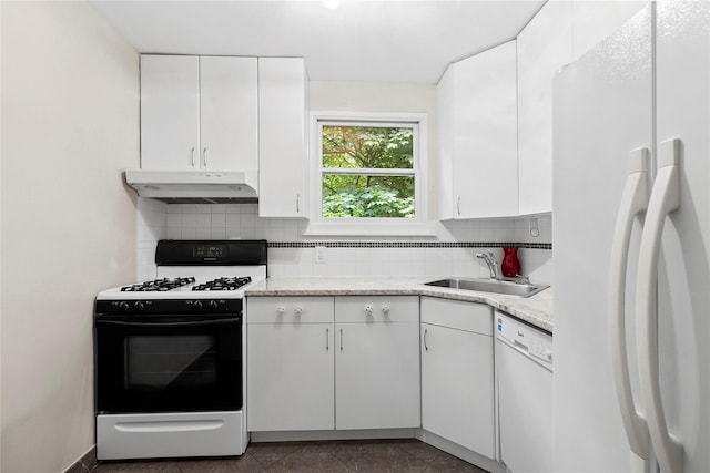 82U Glen Keith Rd Unit 82U, Glen Cove, NY 11542 - kitchen featuring white appliances, under cabinet range hood, backsplash, and white cabinetry