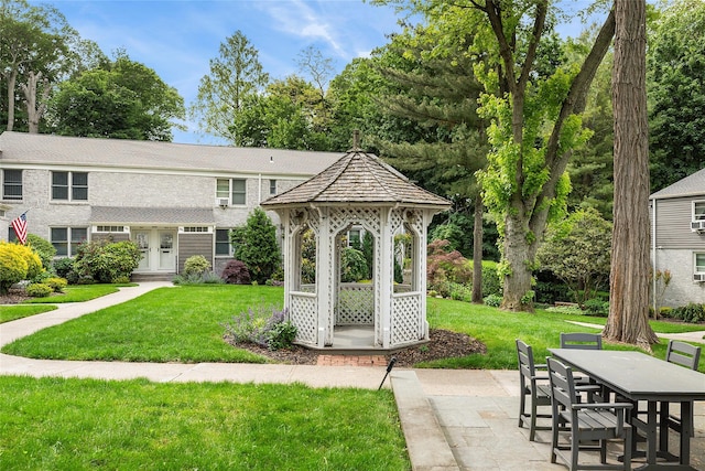 82U Glen Keith Rd Unit 82U, Glen Cove, NY 11542 - view of patio featuring a gazebo and outdoor dining space