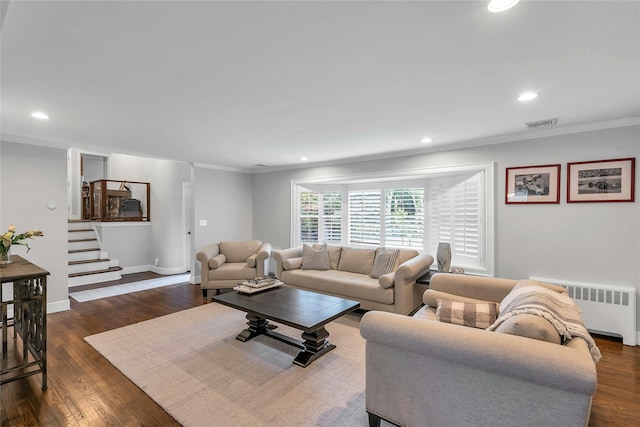 45 Pool Dr, Roslyn, NY 11576 - living area featuring radiator heating unit, crown molding, recessed lighting, dark wood finished floors, and stairs