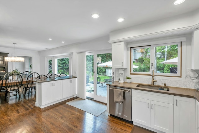 45 Pool Dr, Roslyn, NY 11576 - kitchen with stainless steel dishwasher, a sink, dark countertops, recessed lighting, and white cabinetry