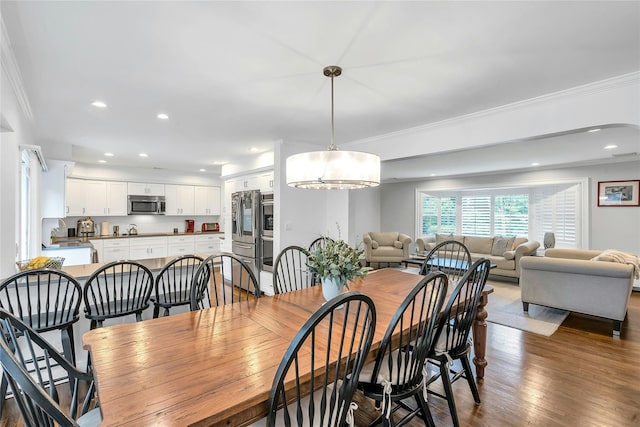 45 Pool Dr, Roslyn, NY 11576 - dining room featuring ornamental molding, wood finished floors, recessed lighting, and a chandelier