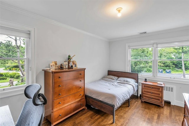 45 Pool Dr, Roslyn, NY 11576 - bedroom with radiator, wood finished floors, and ornamental molding