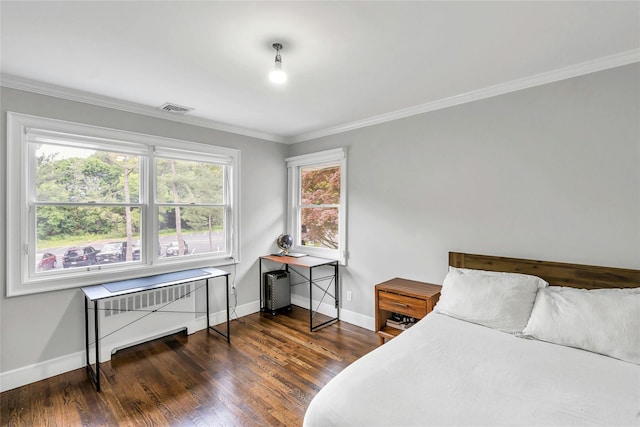 45 Pool Dr, Roslyn, NY 11576 - bedroom featuring wood finished floors, ornamental molding, baseboards, and radiator