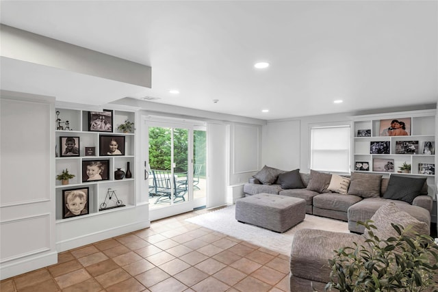 45 Pool Dr, Roslyn, NY 11576 - living area with built in features, a decorative wall, and recessed lighting