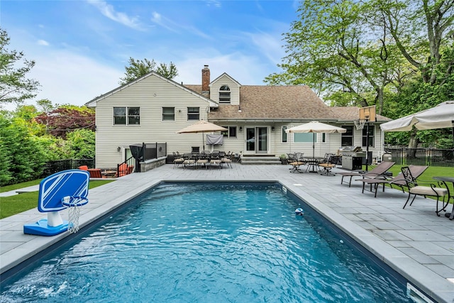 45 Pool Dr, Roslyn, NY 11576 - view of pool featuring entry steps, area for grilling, outdoor dining area, and a patio