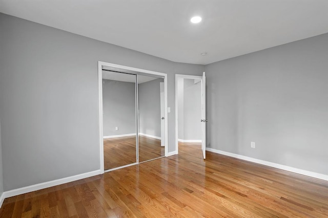 945 Homestead Ave, Maybrook, NY 12543 - unfurnished bedroom featuring a closet, baseboards, and light wood-style floors