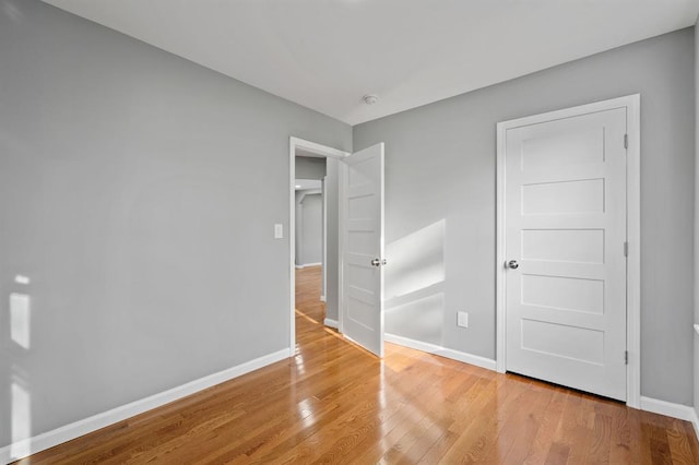 945 Homestead Ave, Maybrook, NY 12543 - unfurnished bedroom with light wood-style flooring and baseboards