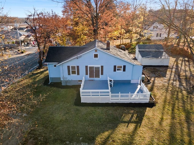 945 Homestead Ave, Maybrook, NY 12543 - back of property with roof with shingles, a chimney, a lawn, and a wooden deck
