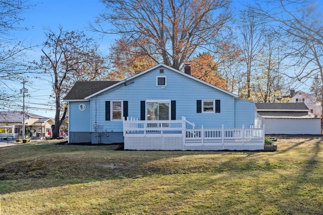 945 Homestead Ave, Maybrook, NY 12543 - rear view of house with a deck, a lawn, and a chimney