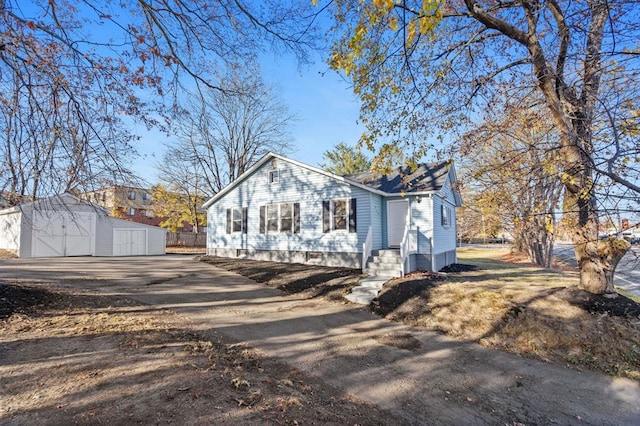 945 Homestead Ave, Maybrook, NY 12543 - view of front of property featuring asphalt driveway and a garage