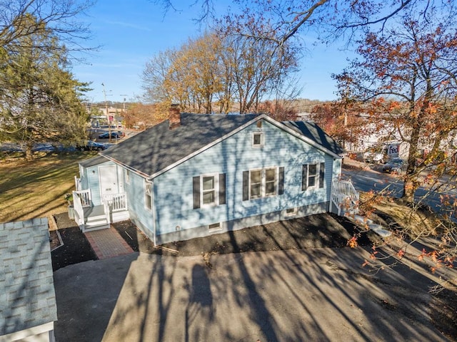 945 Homestead Ave, Maybrook, NY 12543 - rear view of house with a chimney, roof with shingles, and crawl space