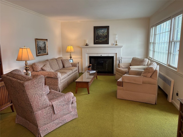 53 Canterbury Ln, North Babylon, NY 11703 - carpeted living area featuring radiator, a fireplace, and ornamental molding