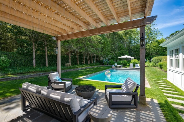 2 Longview Rd, Southampton, NY 11968 - swimming pool featuring an outdoor hangout area, a yard, a patio area, and view of scattered trees