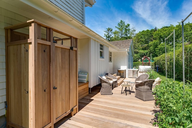 2 Longview Rd, Southampton, NY 11968 - wooden terrace with a grill and an outdoor living space