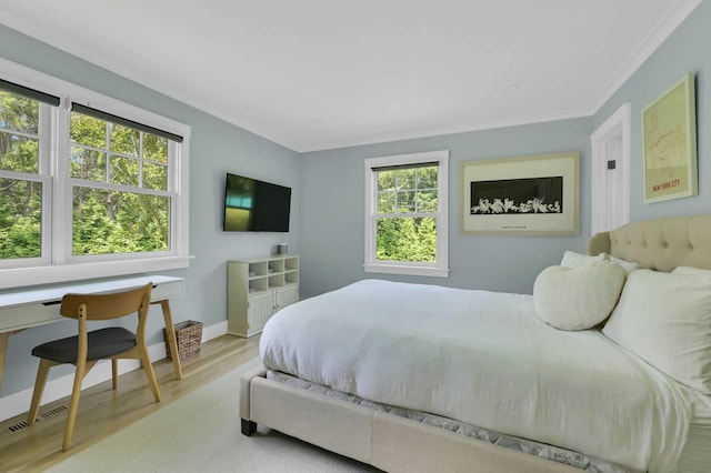 2 Longview Rd, Southampton, NY 11968 - bedroom featuring wood finished floors, baseboards, and ornamental molding
